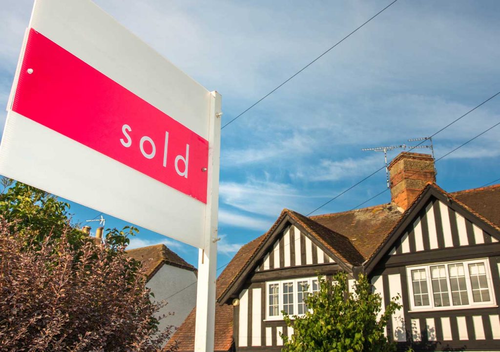 A sold sign outside a UK home.