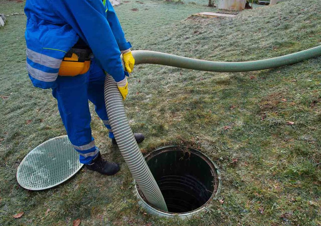 Emptying a septic tank.