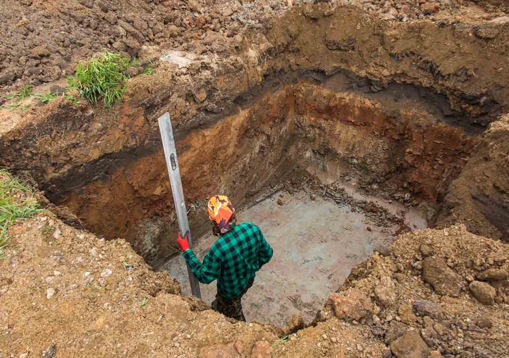 Digging a hole for a septic tank.