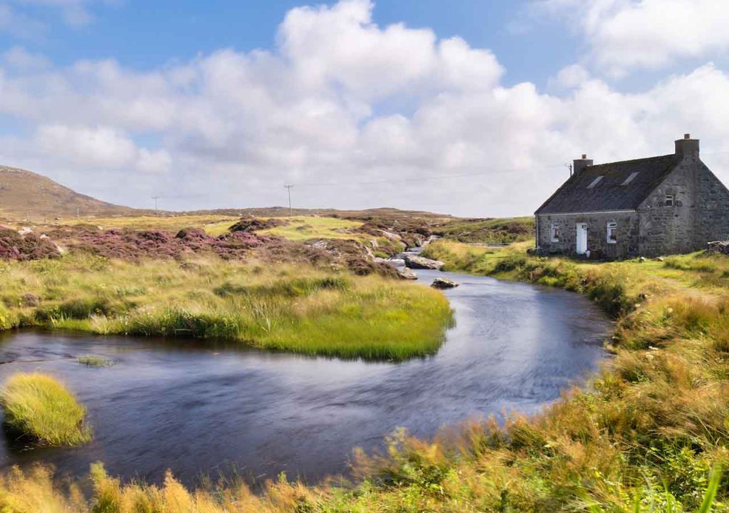 A home in the country by a river.