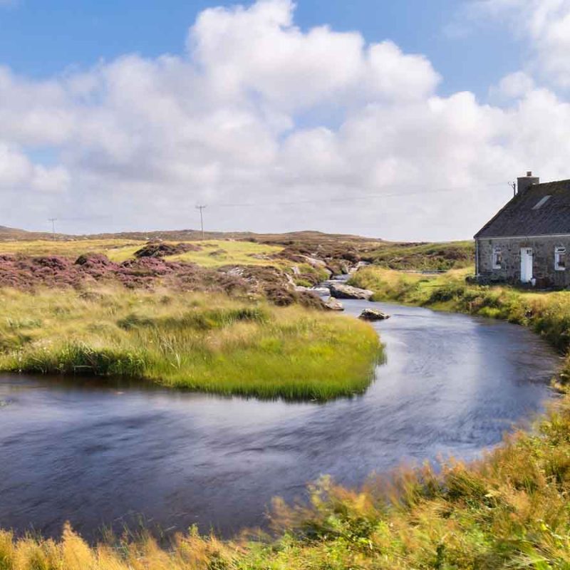 A home in the country by a river.