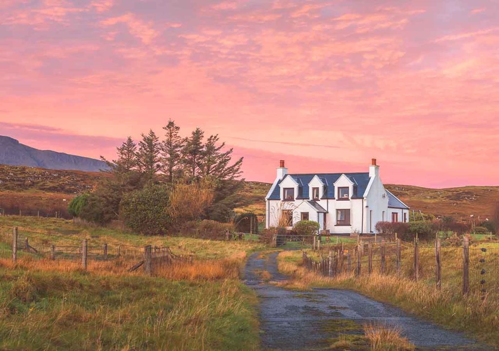 A country house in Scotland at sunset.